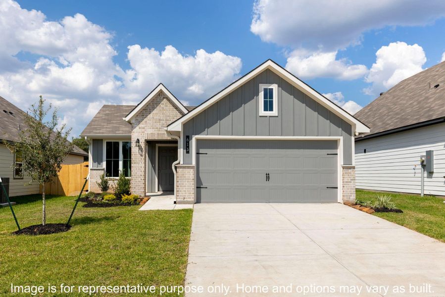 Front exterior of a new home in , Huntsville, TX, highlighting curb appeal (Image 1).