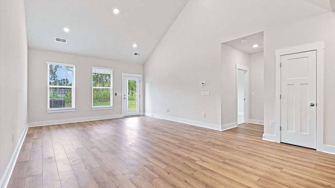 Tasteful family room with high ceilings, modern fixtures, and a warm, inviting feel in Anderson, SC