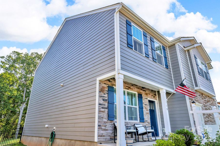 Exterior details and patio area of a home in Calvin Creek, Troutman (Image 21).