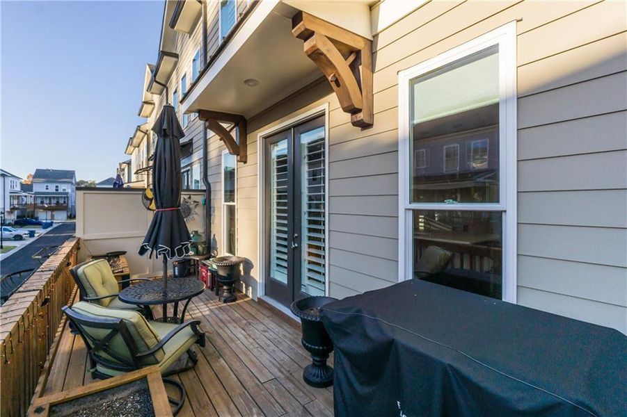 Exterior details and patio area of a home in Evanshire Single Family, Duluth (Image 21).