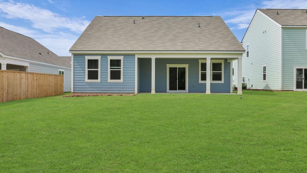 Front exterior of a new home in Lakeview at Kitfield, Moncks Corner, SC, highlighting curb appeal (Image 21). Front exterior of a new home in Lakeview at Kitfield, Moncks Corner, SC, highlighting curb appeal (Image 21).
