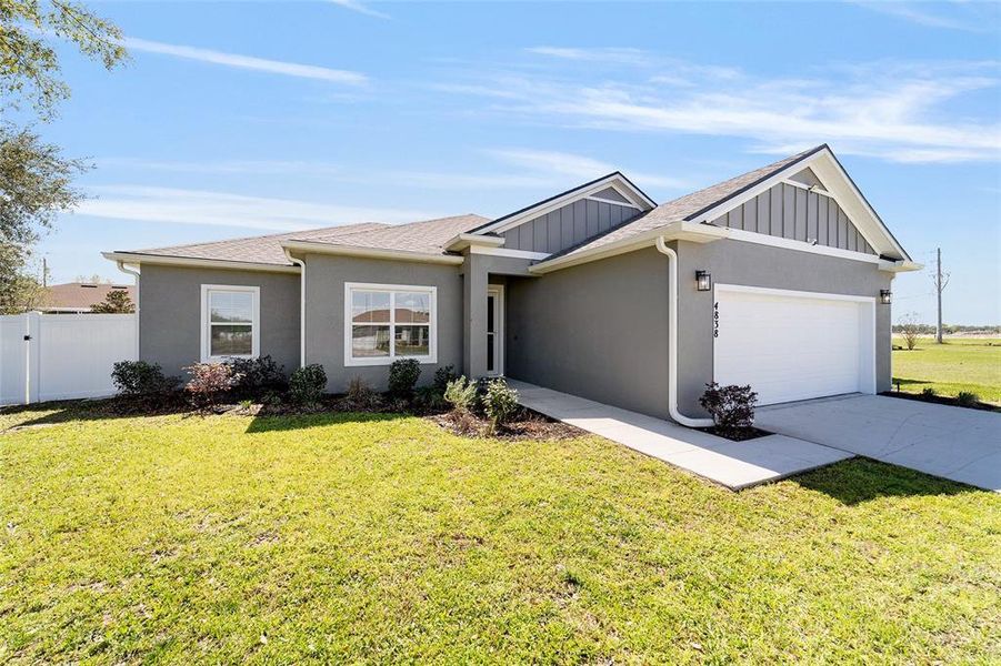 Front exterior of a new home in , Ocala, FL, highlighting curb appeal (Image 23). Front exterior of a new home in , Ocala, FL, highlighting curb appeal (Image 23).