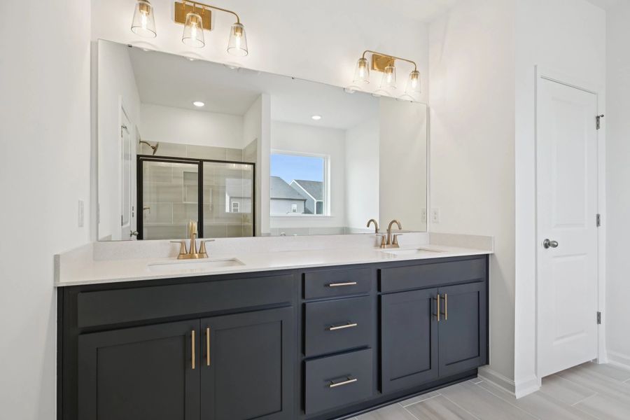 Primary Bath featuring the AW Collection® Sapphire - Clean white and cool hues define the space.