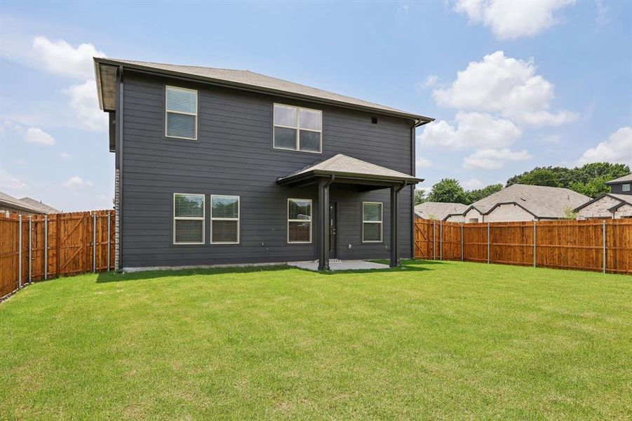 Front exterior of a new home in Westmoor, Sherman, TX, highlighting curb appeal (Image 1).