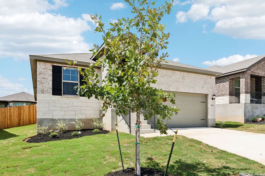Front exterior of a new home in Lark Canyon, New Braunfels, TX, highlighting curb appeal (Image 25).