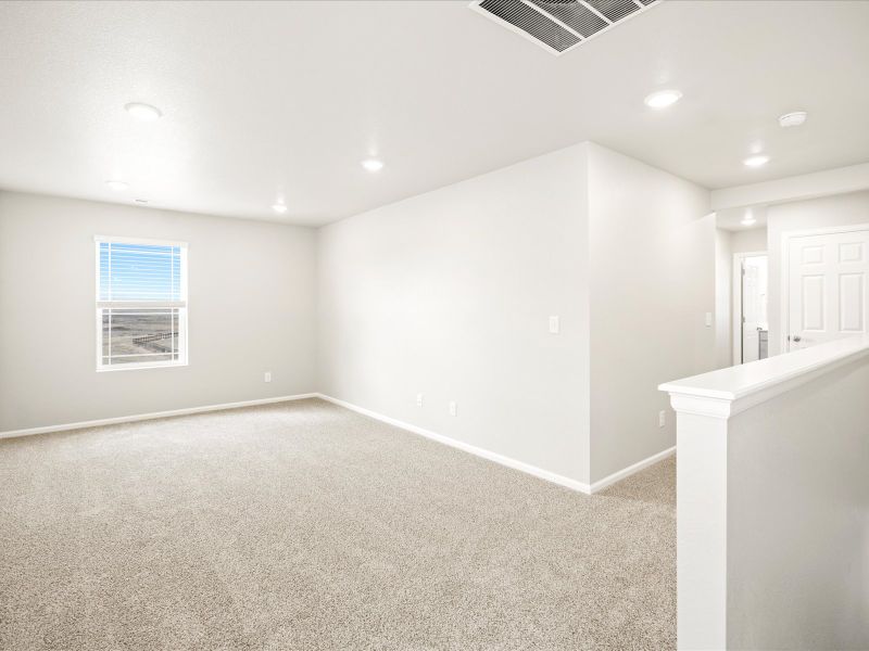 Spacious, unfurnished interior of a new home in Buffalo Highlands: The Flora Collection, Commerce City (Image 10).