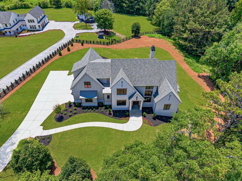 Front exterior of a new home in , Canton, GA, highlighting curb appeal (Image 30).