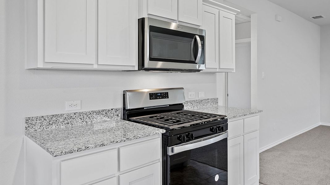 Furnished interior view inside a new home in The Hills at Reunion, Newark (Image 5).