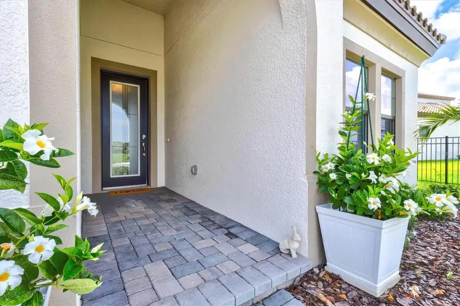 Exterior details and patio area of a home in Crosswind Ranch, Parrish (Image 4).