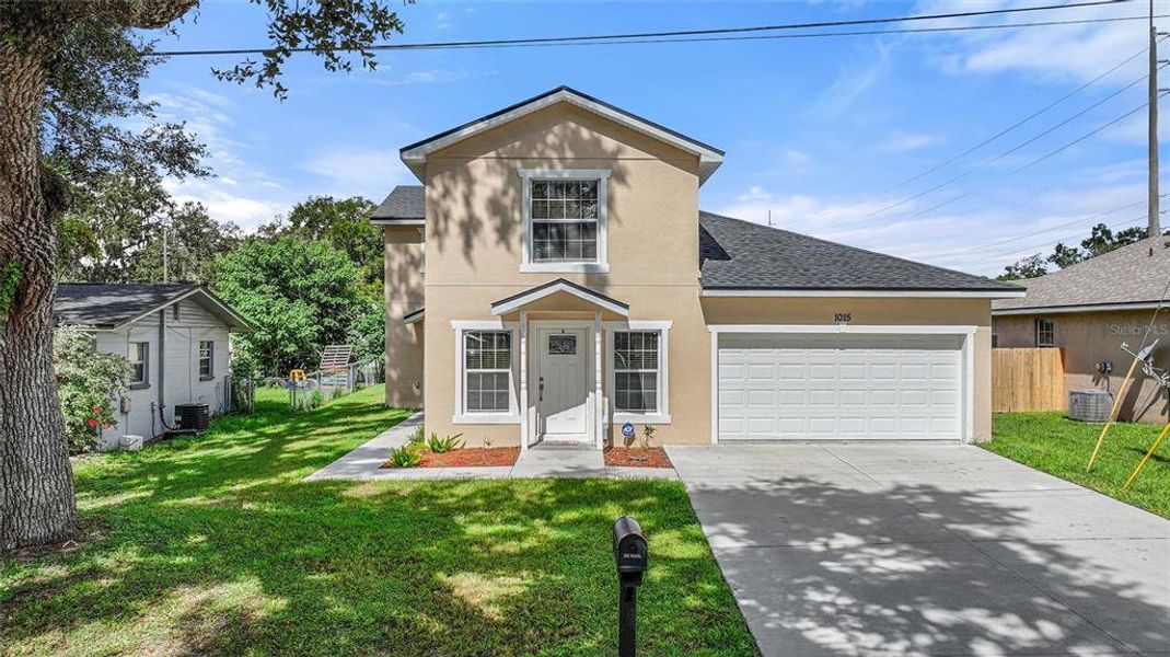 Front exterior of a new home in , Bartow, FL, highlighting curb appeal (Image 24).