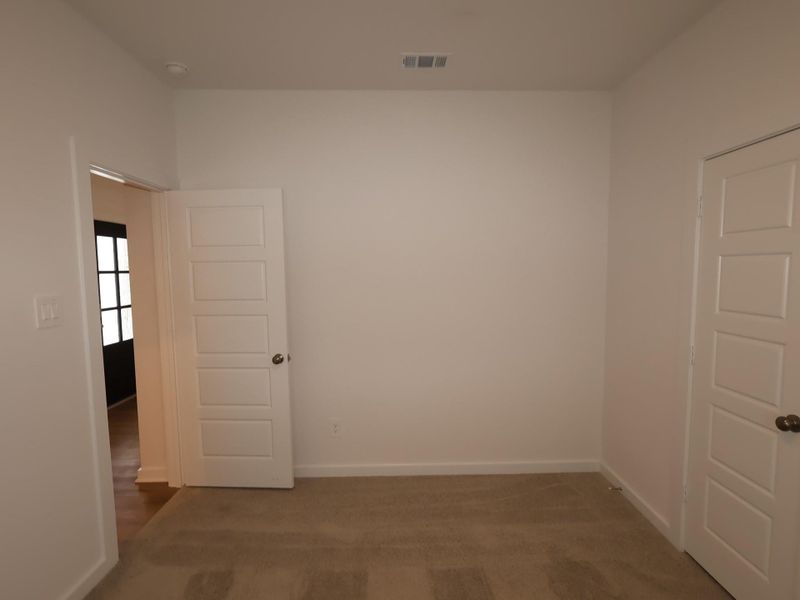 Spacious, unfurnished interior of a new home in Pinewood at Grand Texas, New Caney (Image 30).