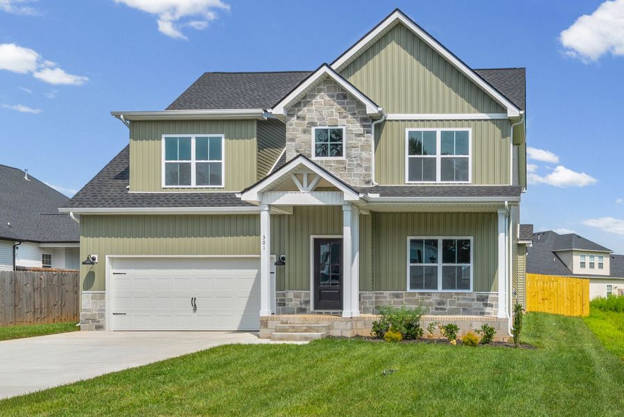 Front exterior of a new home in Summerfield, Clarksville, TN, highlighting curb appeal (Image 25).