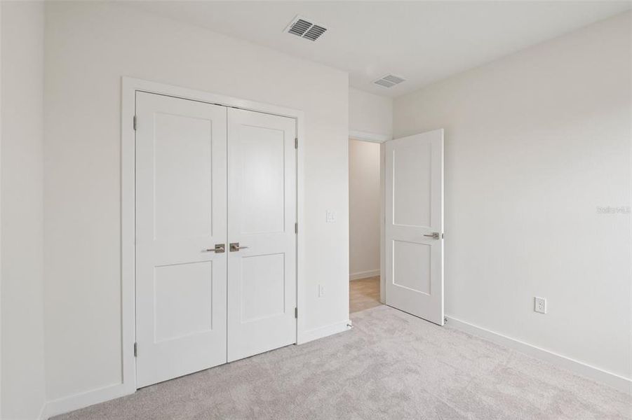 Spacious, unfurnished interior of a new home in Grasslands West, Lakeland (Image 16).
