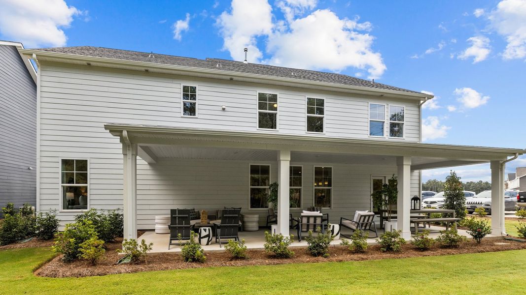 The Townsend Design rear covered porch at Lakeside Glen by premier builder DRB Homes in York, SC.