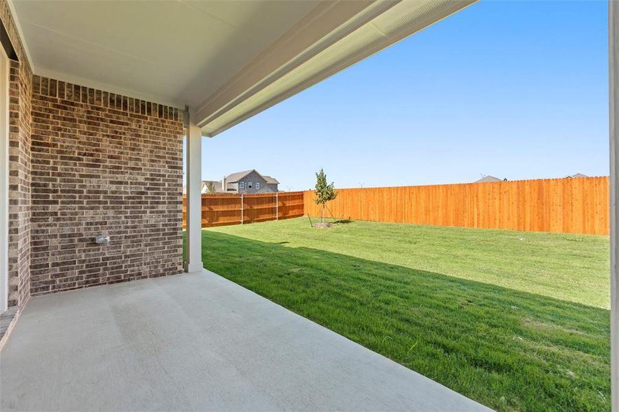 Exterior details and patio area of a home in Morningstar, Aledo (Image 19).