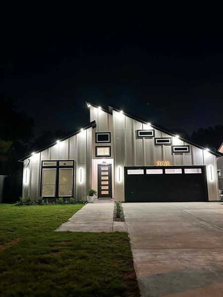 Front exterior of a new home in , Dallas, TX, highlighting curb appeal (Image 26).