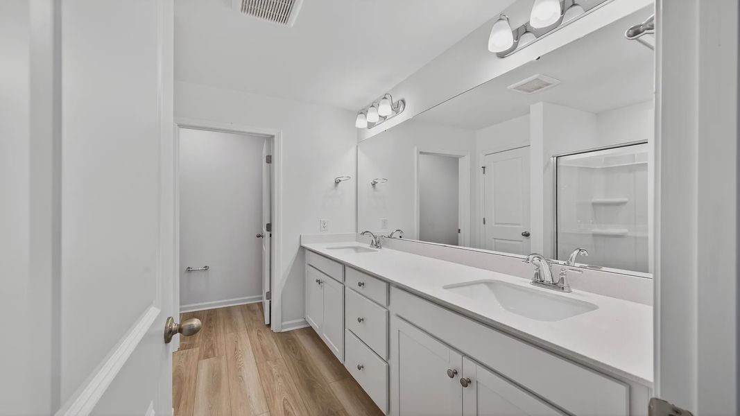 Primary Suite Bathroom in Hayden Floorplan at Clear Springs Townhomes