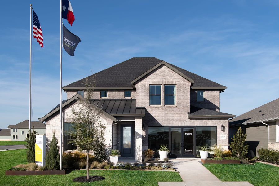 Representative exterior photo of a completed home built from the Evelyn by Tri Pointe Homes in The Meadows, Denton, TX (Image 20). Representative exterior photo of a completed home built from the Evelyn by Tri Pointe Homes in The Meadows, Denton, TX (Image 20).