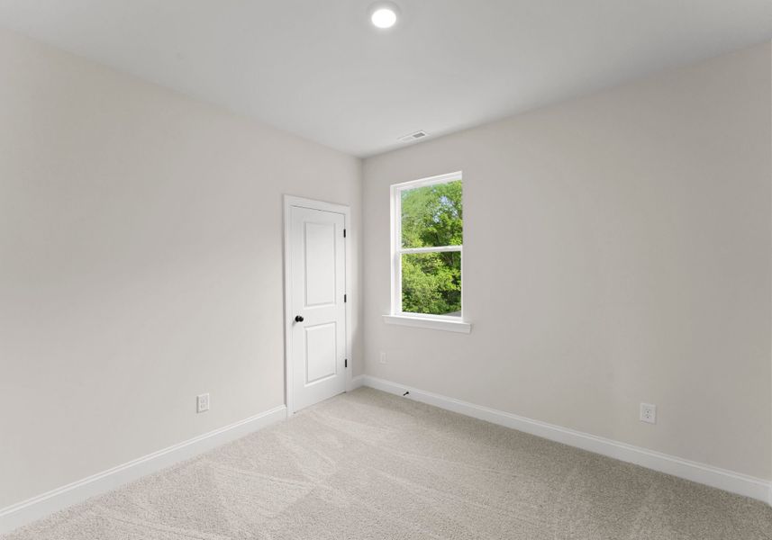 Representative unfurnished interior of a home built from the Lily by Red Cedar Homes in Cedars at First Street, Huntersville (Image 15).