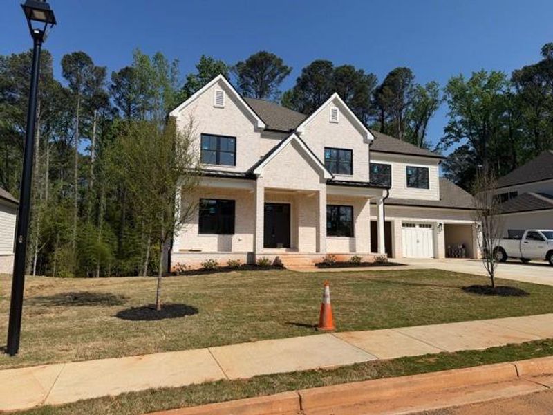 Front exterior of a new home in , Atlanta, GA, highlighting curb appeal (Image 17).