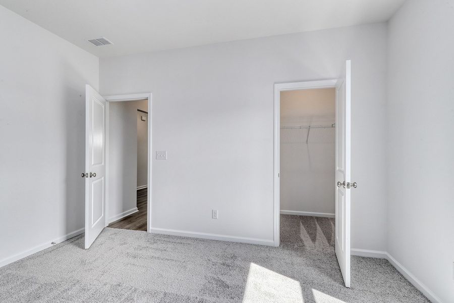 Spacious, unfurnished interior of a new home in Garden Grove, Conway (Image 32).