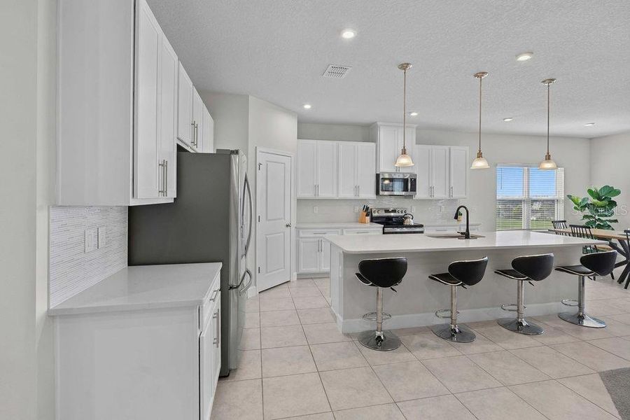 Furnished interior view inside a new home in , Minneola (Image 13). Furnished interior view inside a new home in , Minneola (Image 13).