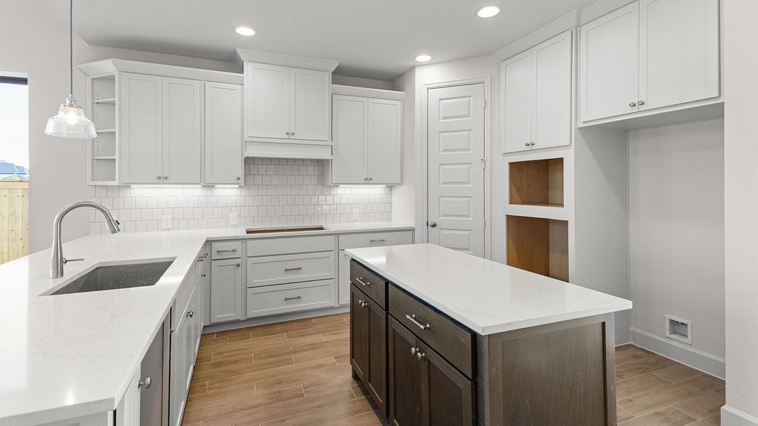 Furnished interior view inside a new home in Bridgeland, Cypress (Image 6).
