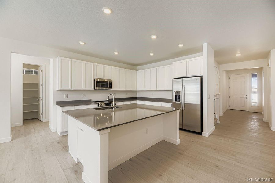 Furnished interior view inside a new home in Ken-Caryl Ranch: The Monarch Collection, Littleton (Image 7).