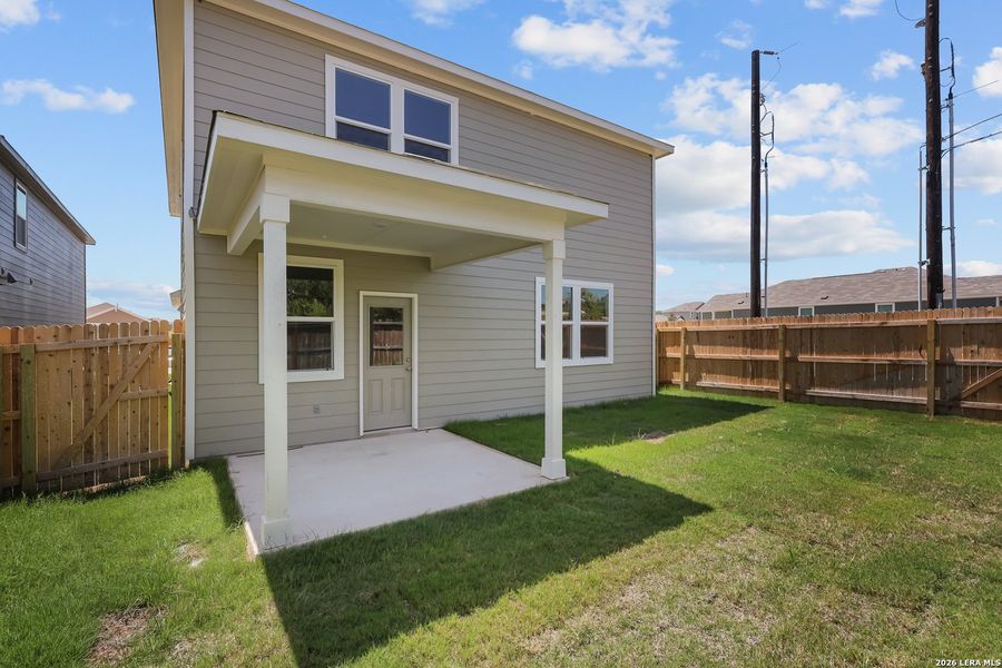 Exterior details and patio area of a home in Spring Creek, San Antonio (Image 20).