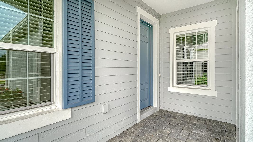 Exterior details and patio area of a home in Wildleaf Real Estate and Homes for Sale in Parrish, FL - Neal Communities, Parrish (Image 2).