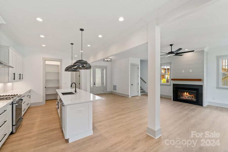 View from Dining room into kitchen and Living Room