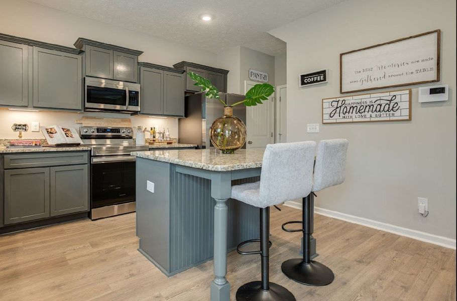 Kitchen 

*Photos are from a staged model home of floor plan. Options and Selections may vary in actual home.