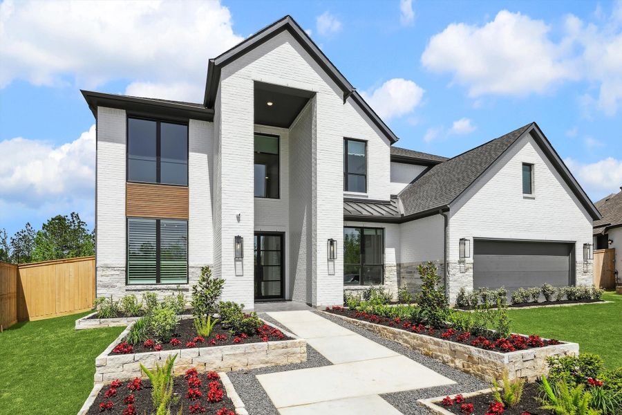 Representative exterior photo of a completed home built from the The Jaxson IX by Westin Homes in Audubon - 70', Magnolia, TX (Image 21).