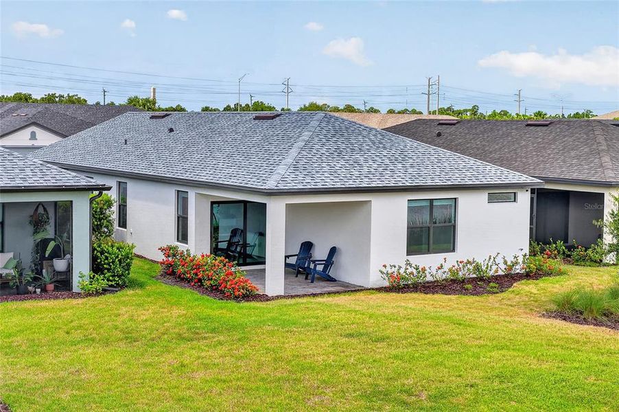 Exterior details and patio area of a home in , Sarasota (Image 26).