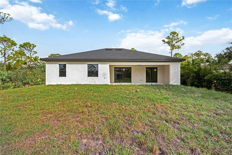 Exterior details and patio area of a home in , Port Charlotte (Image 3).