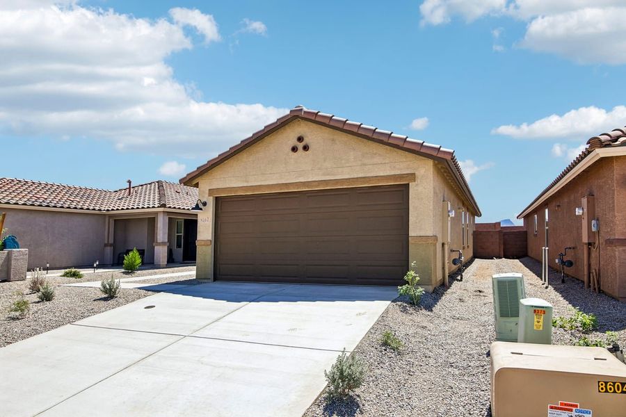 Front exterior of a new home in Mandarina Reserve, Marana, AZ, highlighting curb appeal (Image 15). Front exterior of a new home in Mandarina Reserve, Marana, AZ, highlighting curb appeal (Image 15).