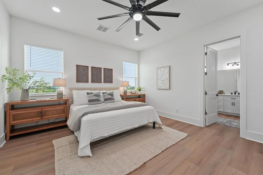 Wake up in the serene primary suite on the main level featuring soft lighting, a tray ceiling, and spa like en-suite. Wake up in the serene primary suite on the main level featuring soft lighting, a tray ceiling, and spa like en-suite.