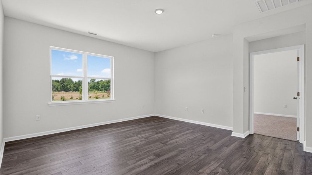 Spacious, unfurnished interior of a new home in The Grove at Matthews Landing, Fuquay Varina (Image 21).