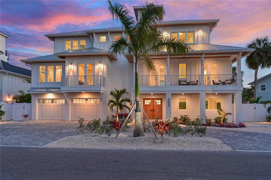Front exterior of a new home in , Holmes Beach, FL, highlighting curb appeal (Image 26).