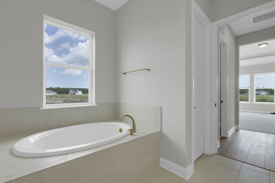 Representative furnished interior of a home built from the Tomoka by Riverside Homes in Hidden Creek at SilverLeaf Phase 1, St. Augustine (Image 40).