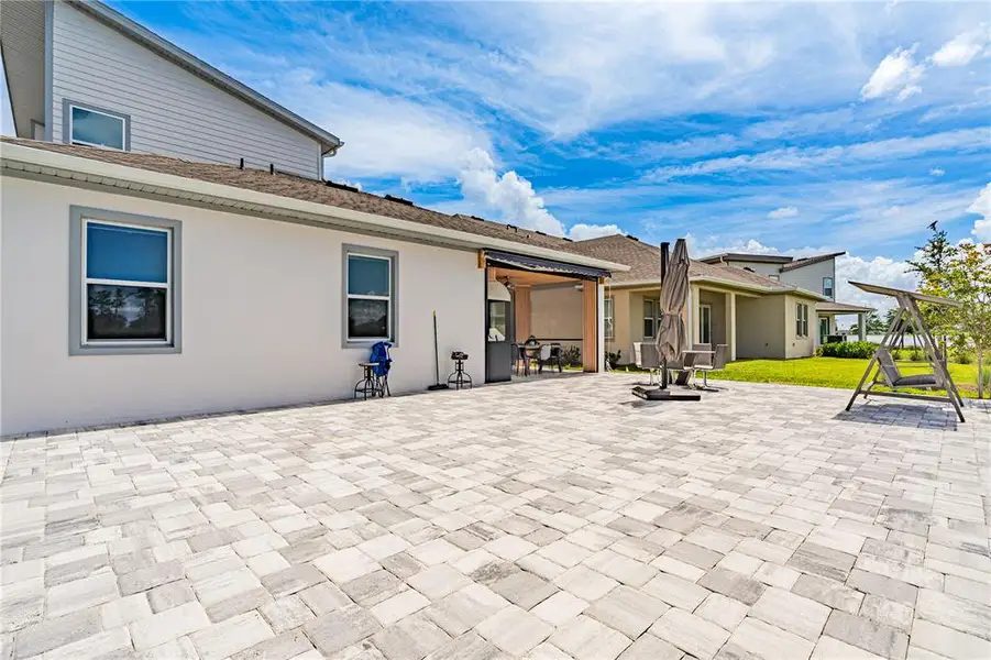 Exterior details and patio area of a home in Laureate Park (Craft Homes), Orlando (Image 3). Exterior details and patio area of a home in Laureate Park (Craft Homes), Orlando (Image 3).