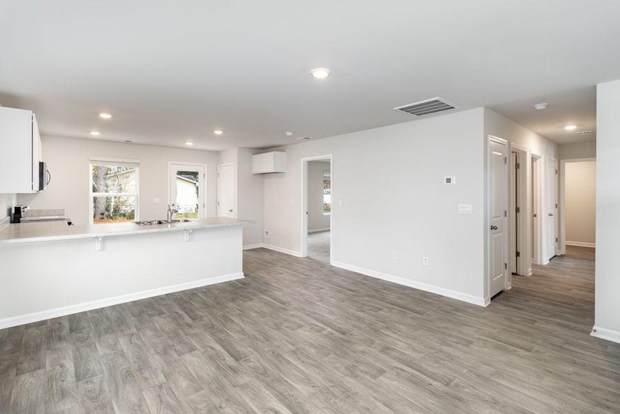 Representative unfurnished interior of a home built from the CURTIS by D.R. Horton in Cottonwood Place, Tabor City (Image 12). Representative unfurnished interior of a home built from the CURTIS by D.R. Horton in Cottonwood Place, Tabor City (Image 12).