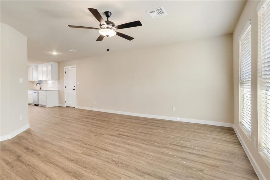 Spacious, unfurnished interior of a new home in Miller Street Cottages, Denison (Image 11).