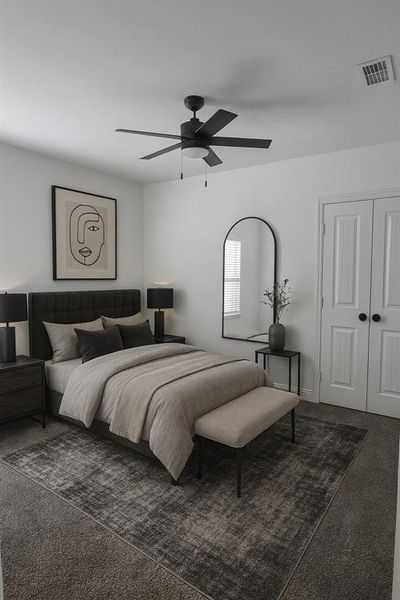 Bedroom with dark colored carpet and a ceiling fan