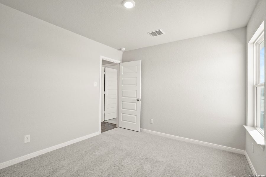 Spacious, unfurnished interior of a new home in Hickory Ridge, Elmendorf (Image 25).