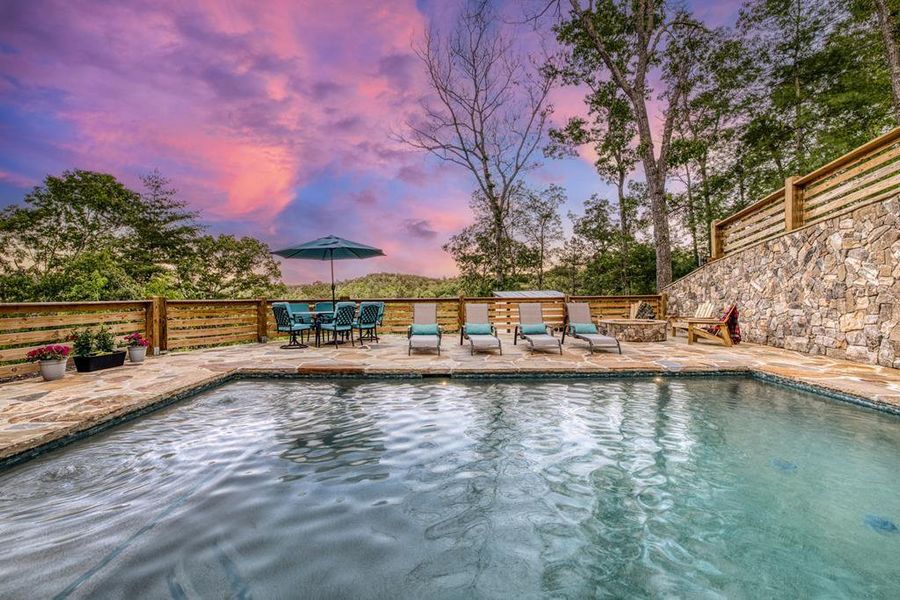 Exterior details and patio area of a home in , Mineral Bluff (Image 24).