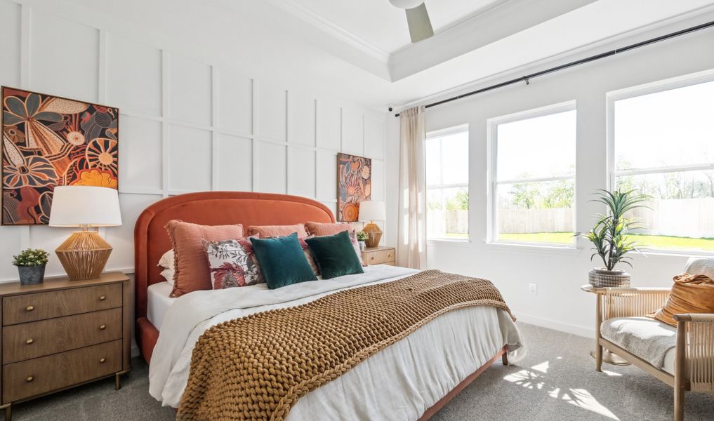 Primary suite with decorative feature wall Primary suite with decorative feature wall