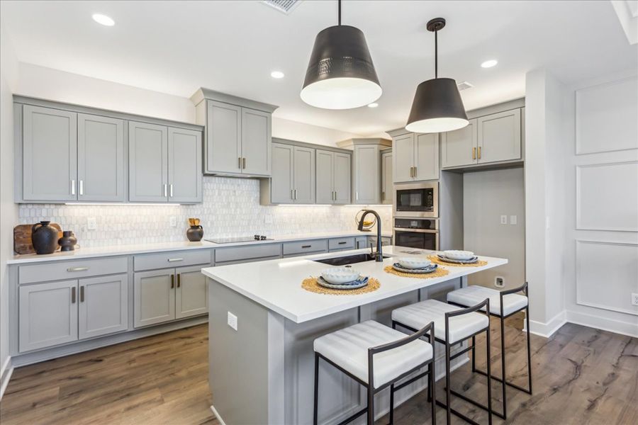 Representative furnished interior of a home built from the Bedford by Perfection Builders in The Courtyards at Cornerstone, Andover (Image 5).
