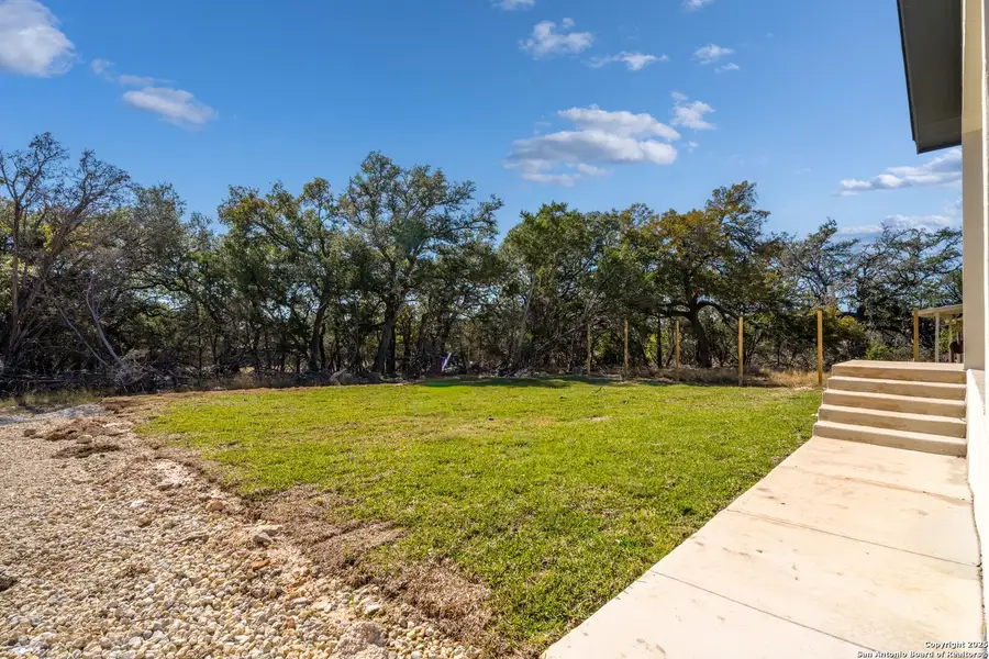 Exterior details and patio area of a home in , Spring Branch (Image 26).