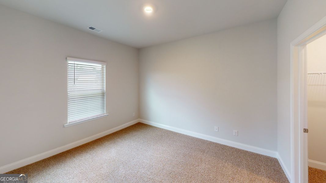 Spacious, unfurnished interior of a new home in Holliday Pass, Griffin (Image 20).